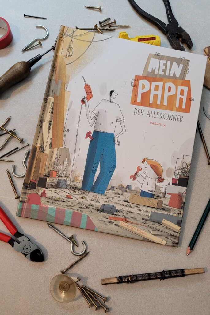 Das Bilderbuch „Mein Papa - der Alleskönner“ von Barroux als Flatley mit Werkzeug, Schrauben und Co.