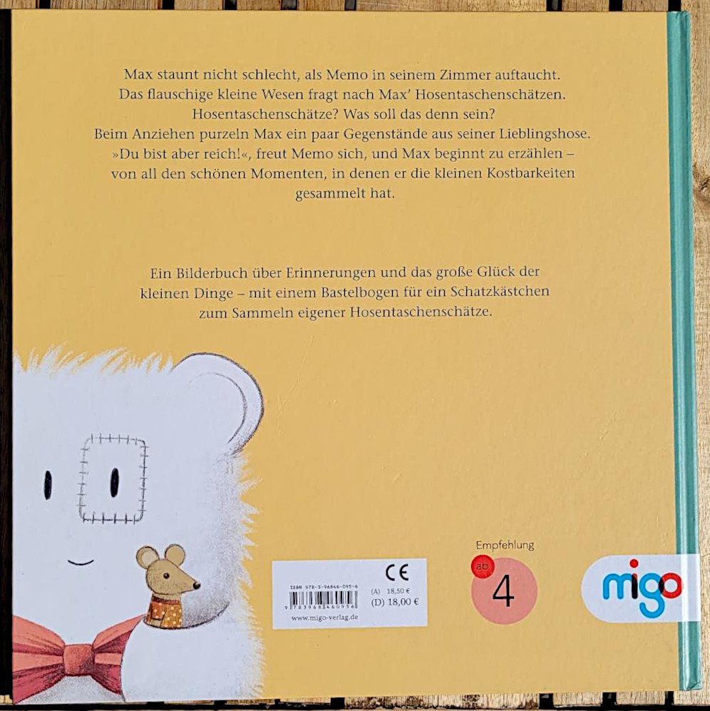 Die Rückseite des Bilderbuches „Max und Memo: Eine Schatzkiste voller Erinnerungen“ von Marc Widmer, Coralie Spätig und Yasmin Karim