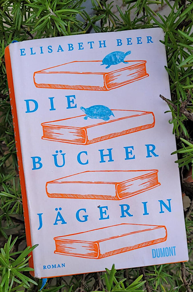 Der Roman „Die Bücherjägerin“ von Elisabeth Beer in Rosmarin
