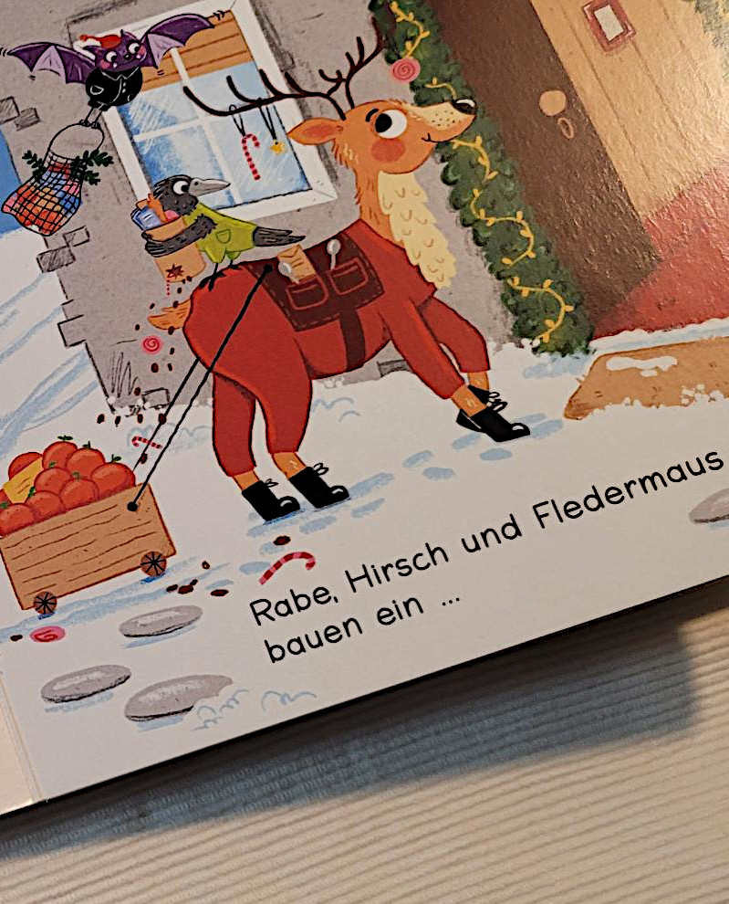 Ausschnitt einer Innenseite des Bilderbuches „Kakadu und Kolibri fahren eine Runde ... Ski“ von Katja Frixe und Juliane Zickelbein